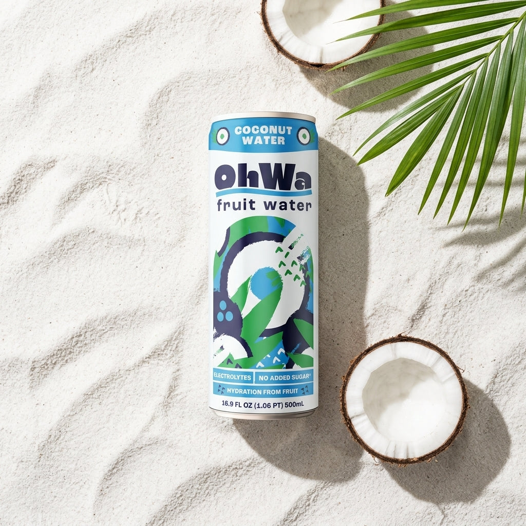 OhWa coconut water can on sand with coconuts and a palm leaf