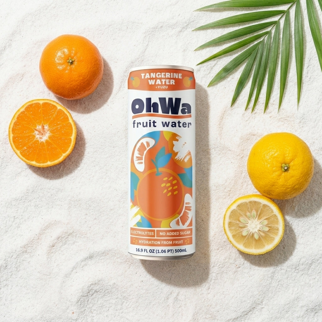 OhWa fruit water can with oranges and lemons on a sandy background