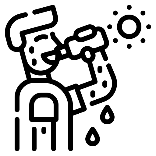 Black and white icon of a person using a wheelchair with water droplets and bubbles around.